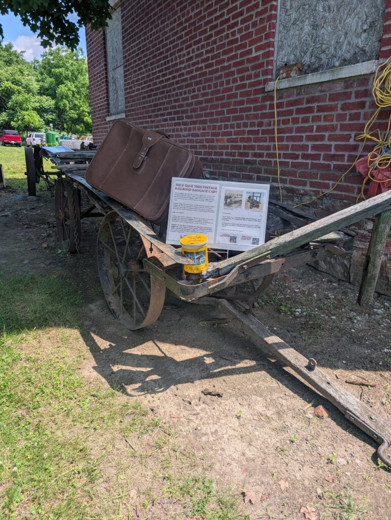 Chatham Village Historical Society help save the vintage railroad baggage cart.